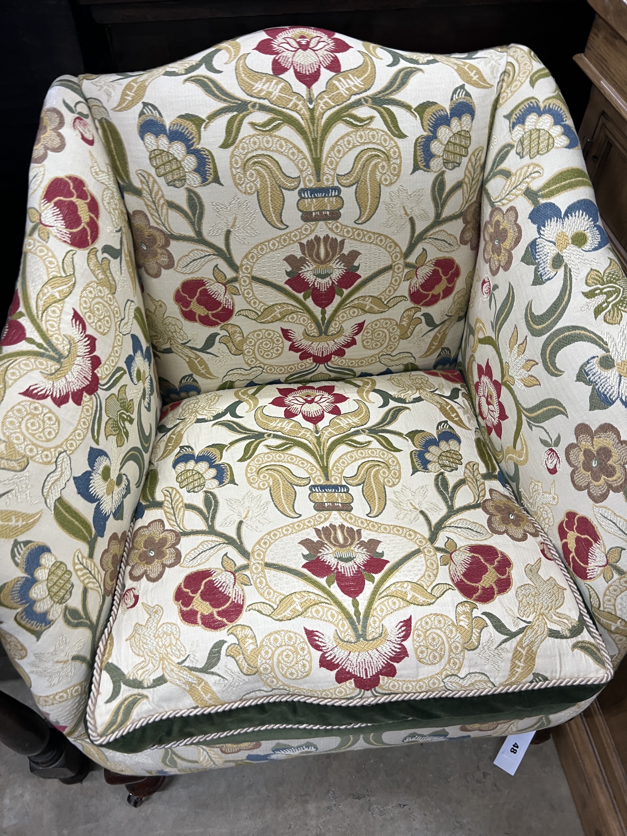 An Edwardian upholstered square framed elbow chair, width 72cm, depth 62cm, height 76cm